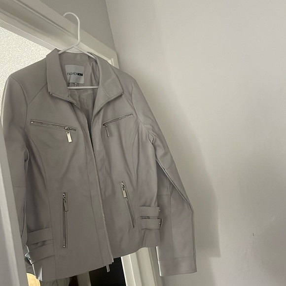 A new, never worn before gray jacket. - Picture 1 of 2